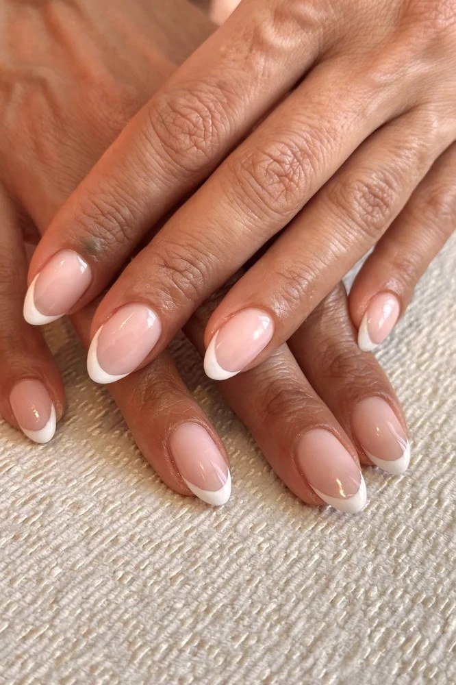 Timeless Almond French Tips, french tip nails for women over 70, elegant manicure on mature hands