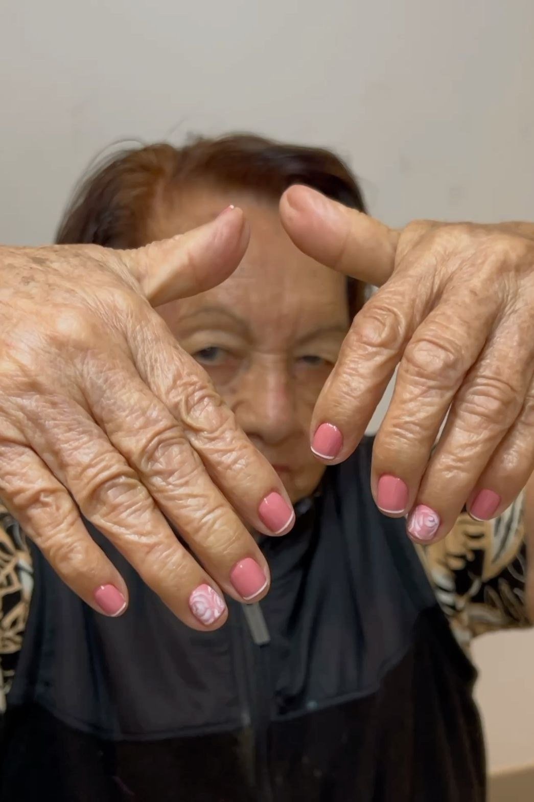 Pink-Toned French Tips, french tip nails for women over 70, elegant manicure on mature hands