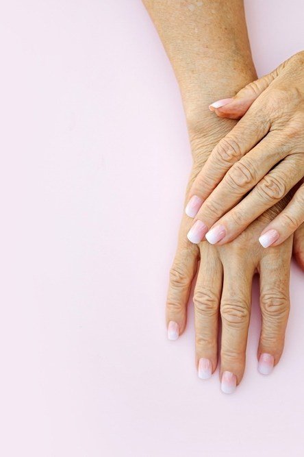 Almond French Tips with a Blush Base, french tip nails for women over 70, elegant manicure on mature hands
