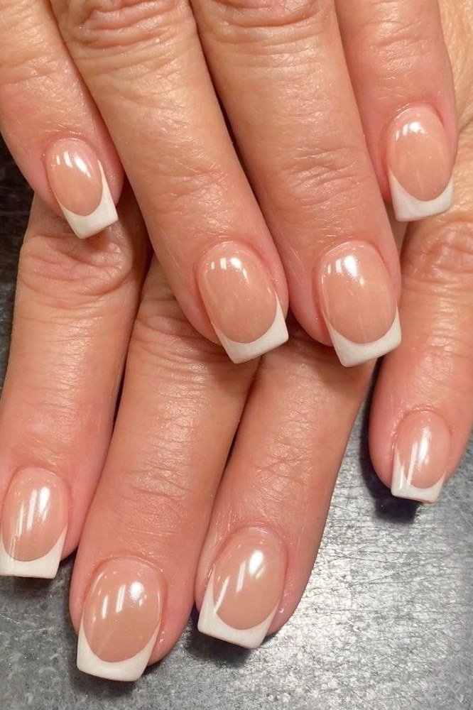 Almond French Tips on a Pink Base, french tip nails for women over 70, elegant manicure on mature hands