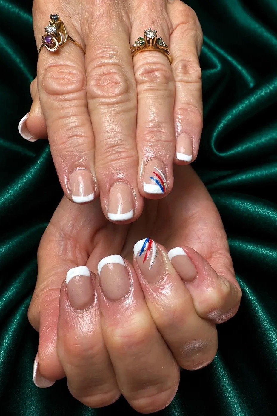 White French Tips with a Striped Accent, french tip nails for women over 70, elegant manicure on mature hands