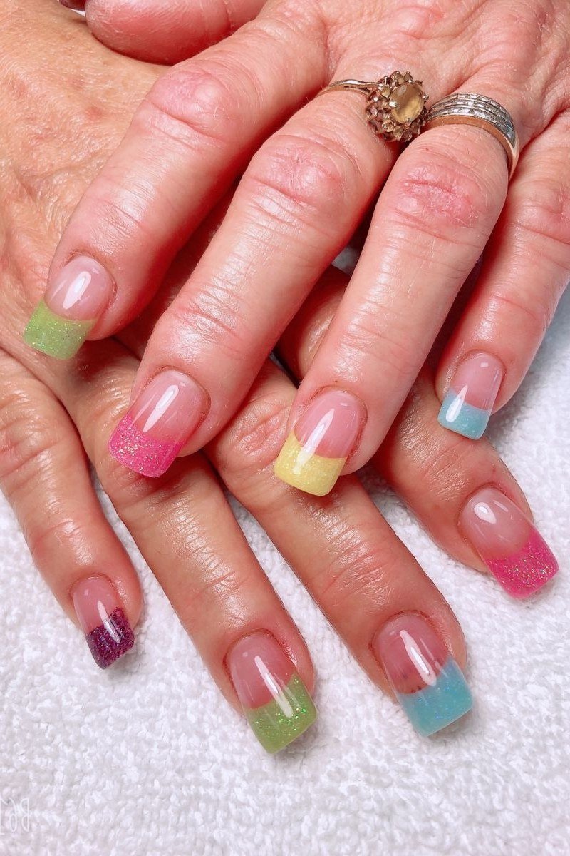 Pastel-Tipped French Nails, french tip nails for women over 70, elegant manicure on mature hands