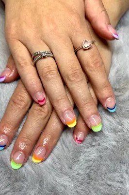 Neon-Tipped French Nails, french tip nails for women over 70, elegant manicure on mature hands