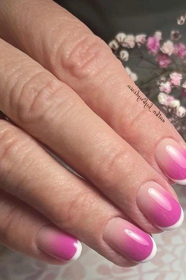 Pink gradient french manicure with baby's breath flowers