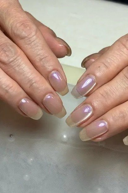 Pearl chrome french manicure, macro closeup