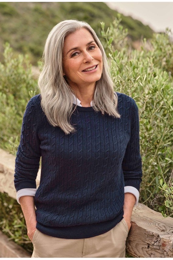 Fall sweater outfit idea 24 for women over 60: navy crewneck with tan pants