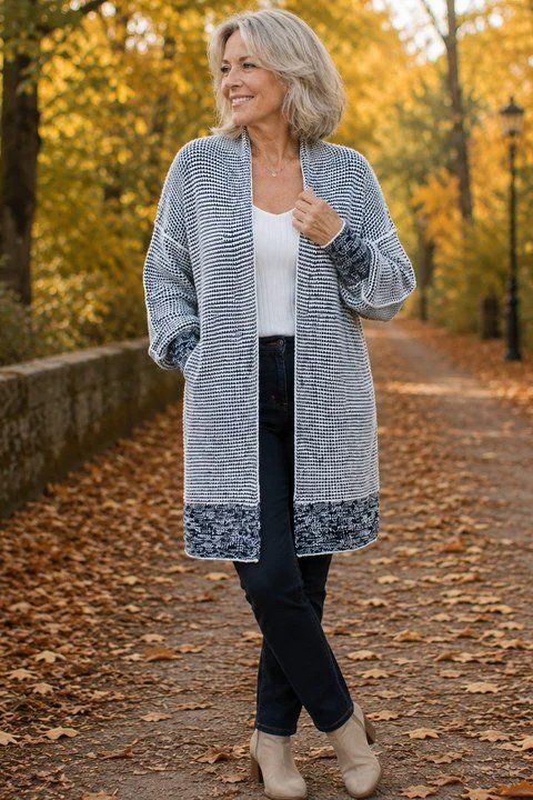 Fall sweater outfit idea 32 for women over 60: gray long cardigan with white top and black jeans