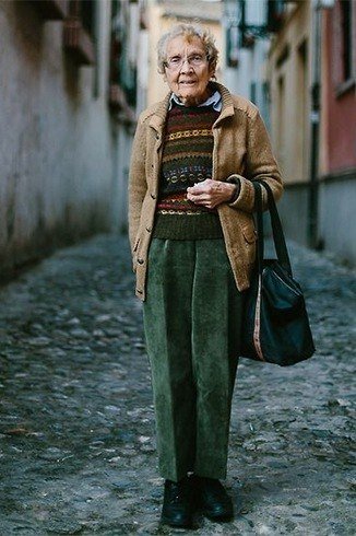 Fall sweater outfit idea 49 for women over 60: fair isle sweater with suede jacket and green pants