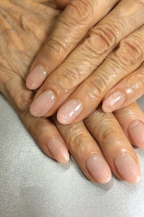 Glossy Nude Beige Nails - gel nail design for women over 50