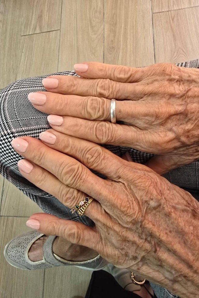 Nude Nails on Mature Hands - gel nail design for women over 50