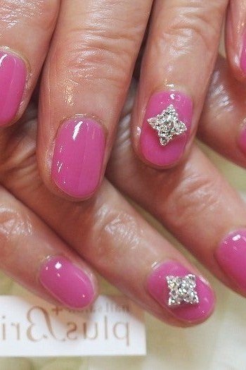 Hot Pink Nails with Rhinestones - gel nail design for women over 50