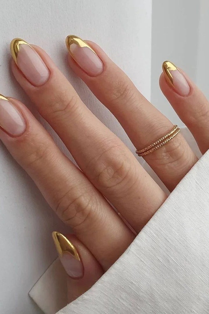 Gold chrome French tip nails on sheer pink nude almond nails, elegant mother of the groom wedding nails