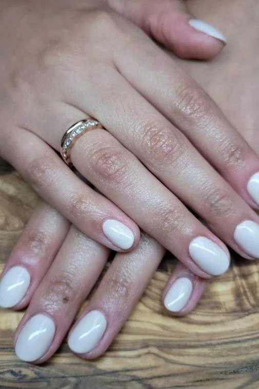 milky white almond nails, soft opaque white manicure for older women