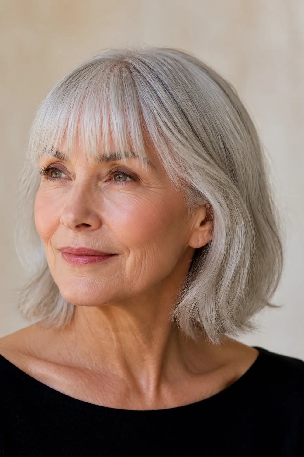Silver Bob with Featherlight Wispy Bangs for women over 60, grey hairstyle with bangs