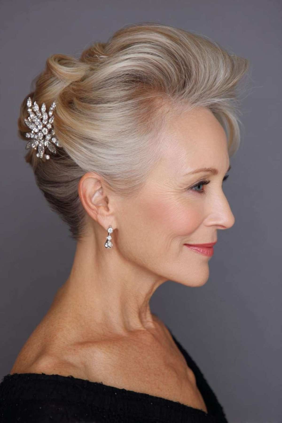 Silver Swept Updo With Jeweled Side Comb - Christmas party hairstyle for women over 60 (silver swept updo with jeweled side comb, side view)