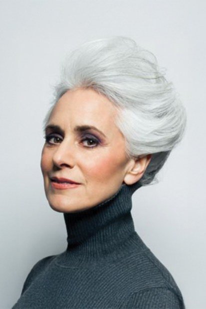 Silver Bouffant Updo - Christmas party hairstyle for women over 60 (silver bouffant updo, front three-quarter view)