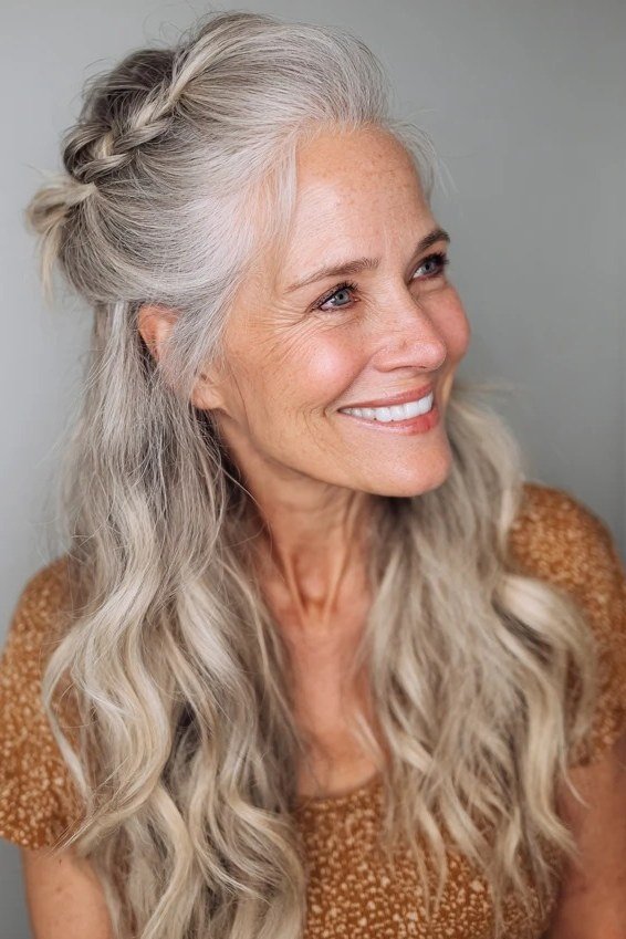 Silver Braided Half-Up Crown - Christmas party hairstyle for women over 60 (silver braided half-up crown, joyful front view)
