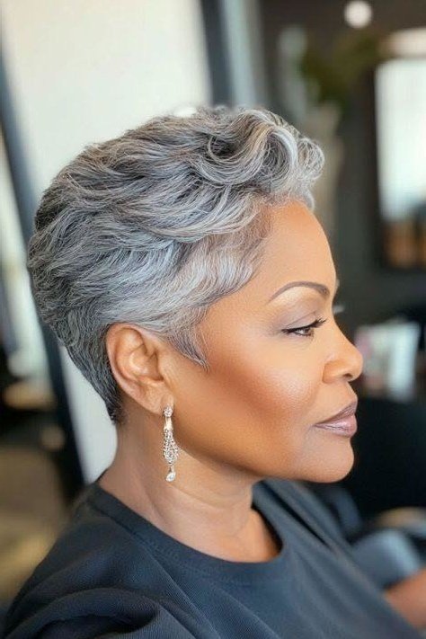 Short Gray Pixie on Dark Skin - Christmas party hairstyle for women over 60 (short gray pixie on dark skin, three-quarter view)