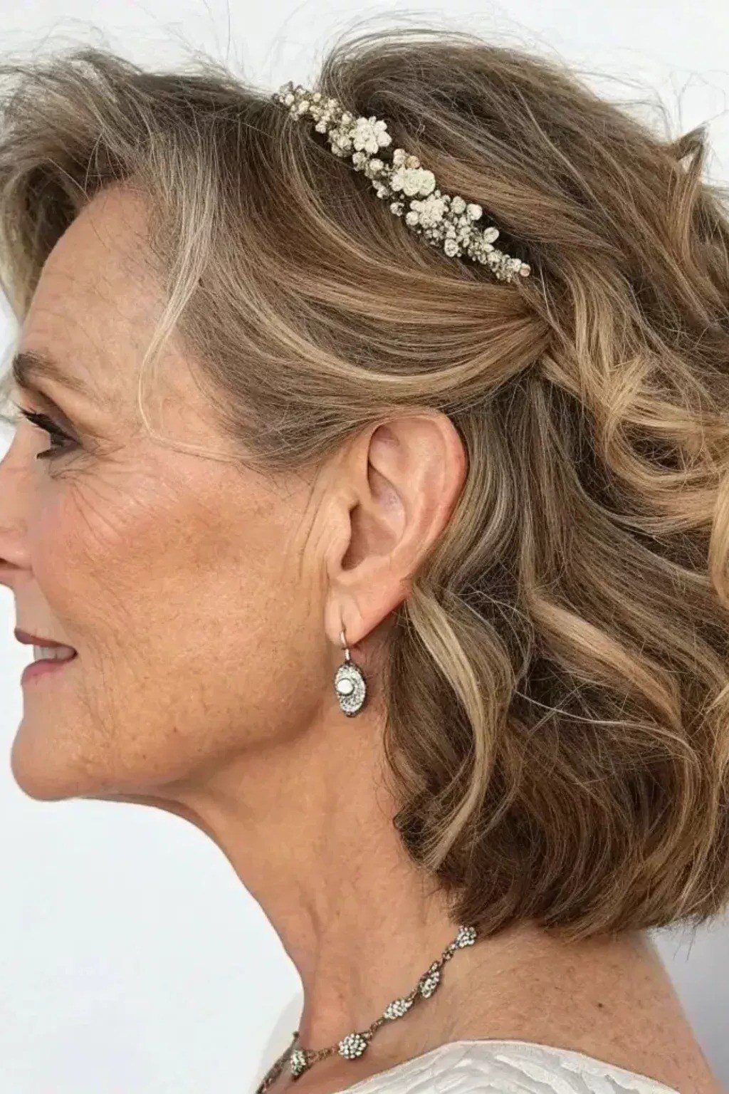 Curly Brown Bob With Jeweled Headband - Christmas party hairstyle for women over 60 (curly brown bob with jeweled headband, side view)