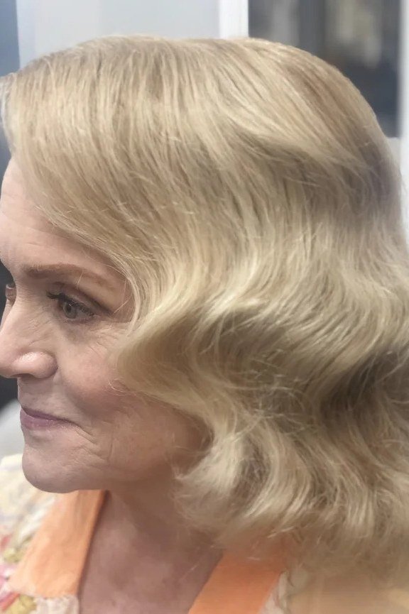 Blonde Vintage Finger-Wave Bob - Christmas party hairstyle for women over 60 (blonde vintage finger-wave bob, side view)