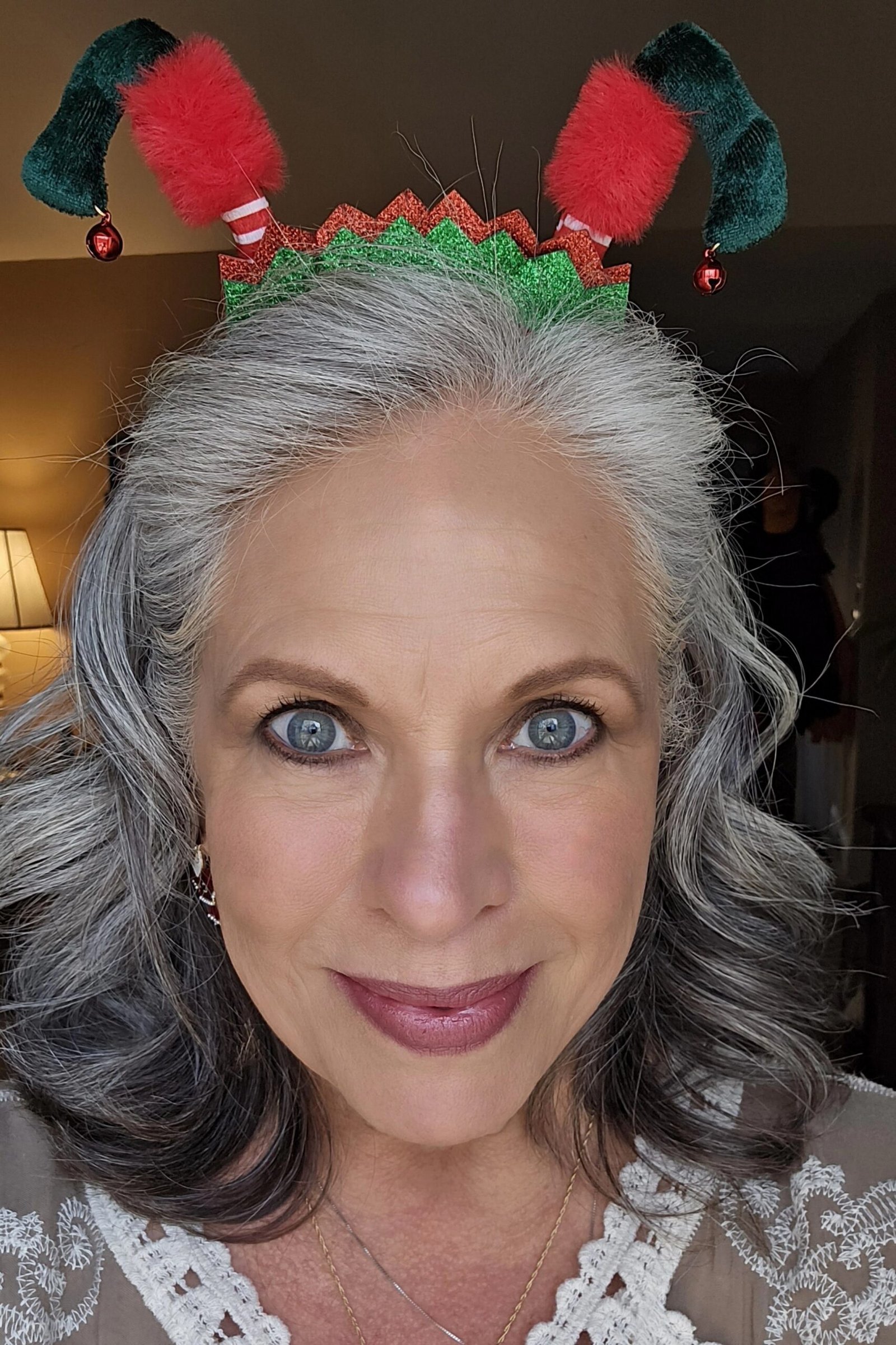 Gray Waves With Festive Elf-Ear Headband - Christmas party hairstyle for women over 60 (gray waves with festive elf-ear headband, front view)