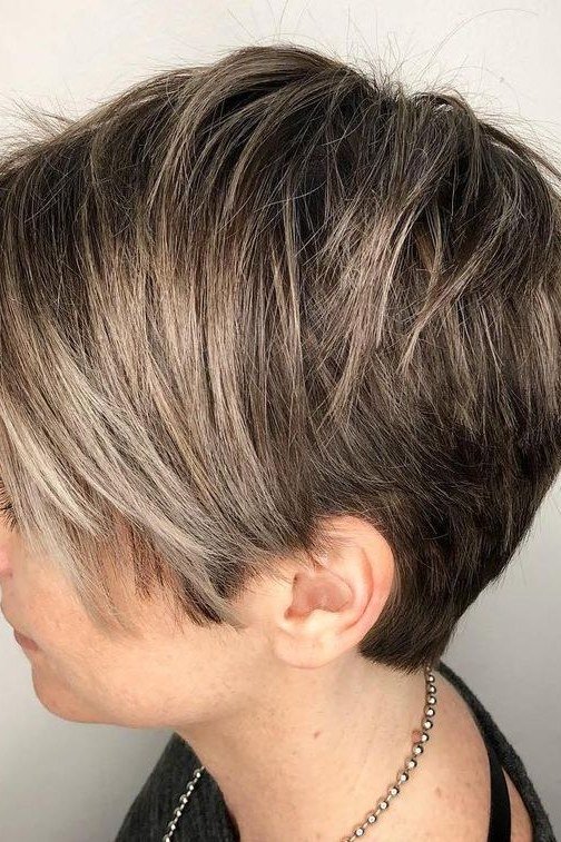 Layered salt and pepper pixie cut, side view
