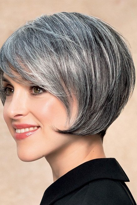 Salt and pepper pixie bob haircut, smiling