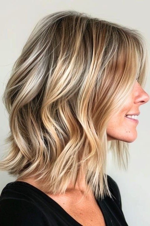Blonde Wavy Lob with Side Part - medium wavy hairstyle for women over 60 (idea 17 of 70)