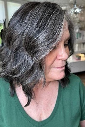 Dark Silver Wavy Bob with Green Accent - medium wavy hairstyle for women over 60 (idea 42 of 70)