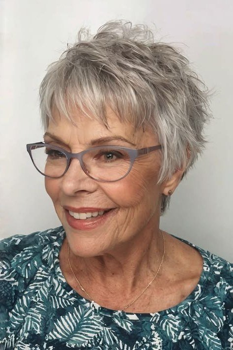 White pixie haircut with glasses for women over 60, front view
