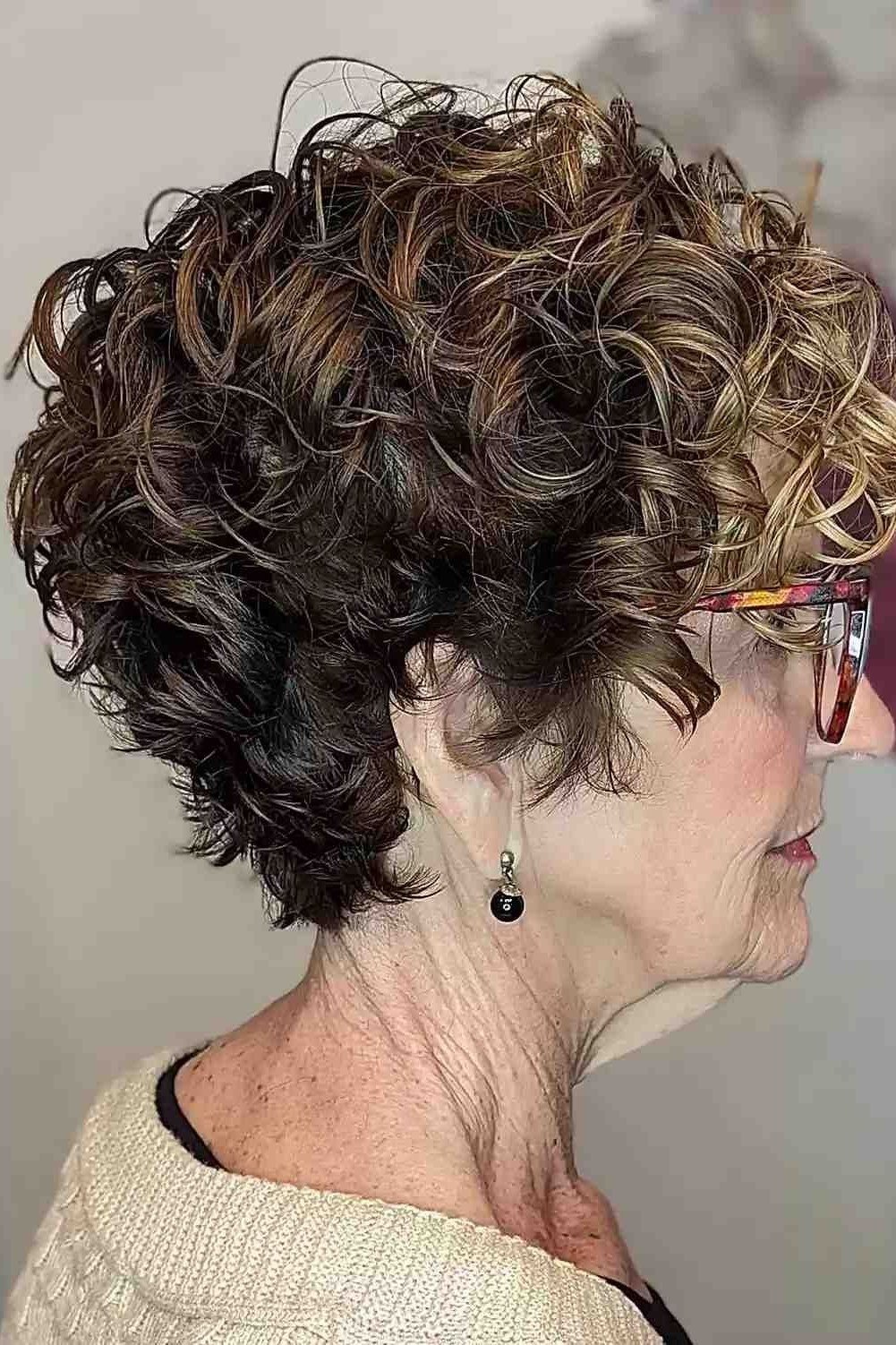 curly dark-brown pixie, side profile, glasses, for older women