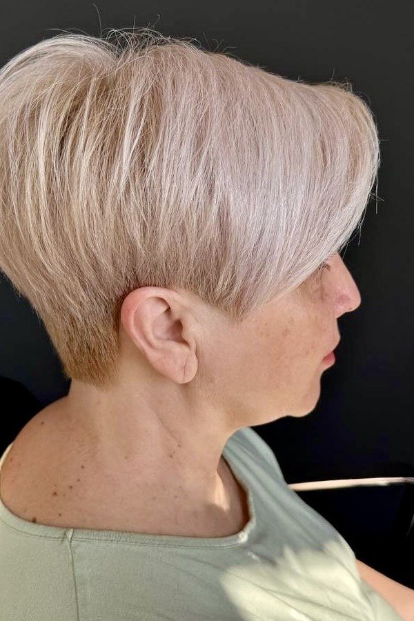 pink-blonde pixie, side profile, for older women