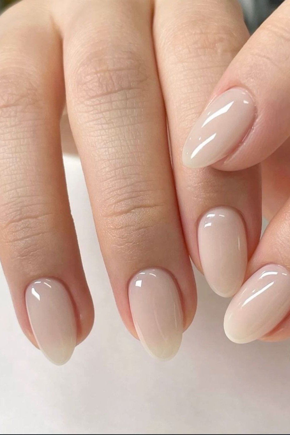 creamy gloss almond nails - honey glazed nude nails for women over 50
