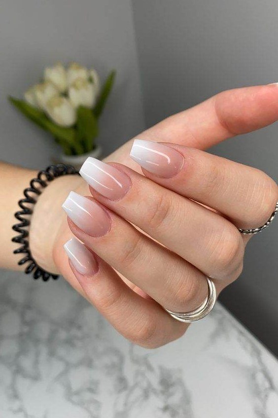 clean white french almond nails - honey glazed nude nails for women over 50