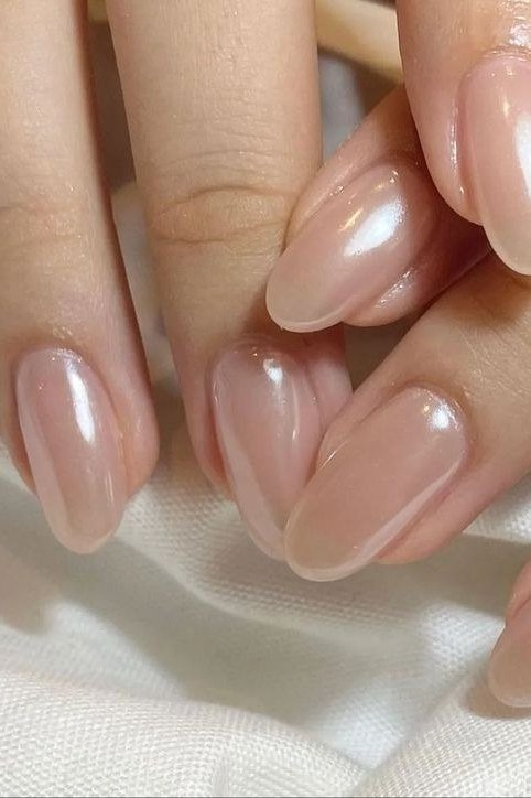 glazed chrome almond nails close up - honey glazed nude nails for women over 50