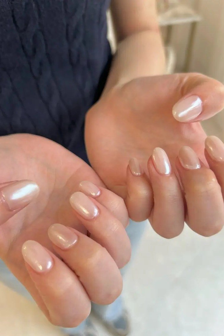 short chrome almond nails - honey glazed nude nails for women over 50