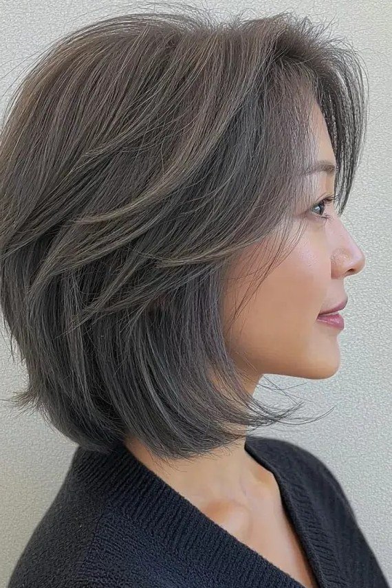 Silver-Gray Bob with Soft Bangs, Side View - hush cut hairstyle for women over 50, idea 40