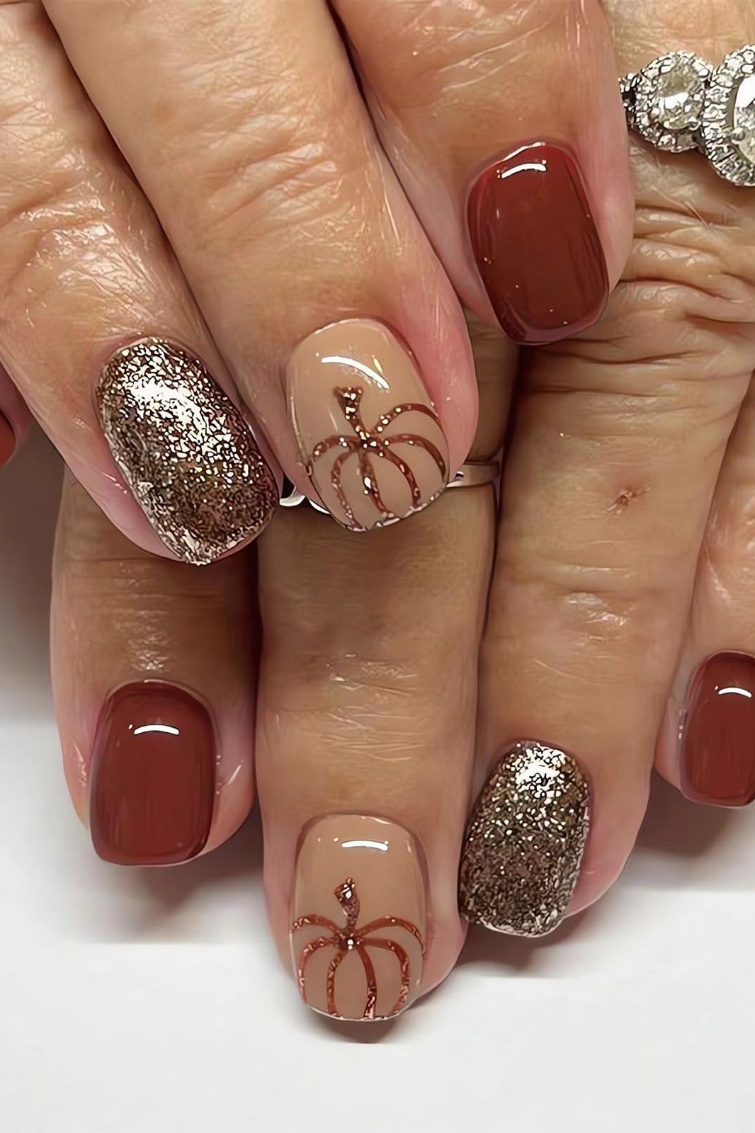 Terracotta Nails with Gold Glitter and Pumpkins for women over 50