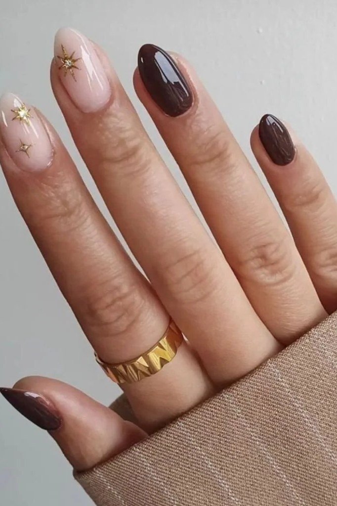 Dark Plum and Nude Nails with Gold Stars for women over 50