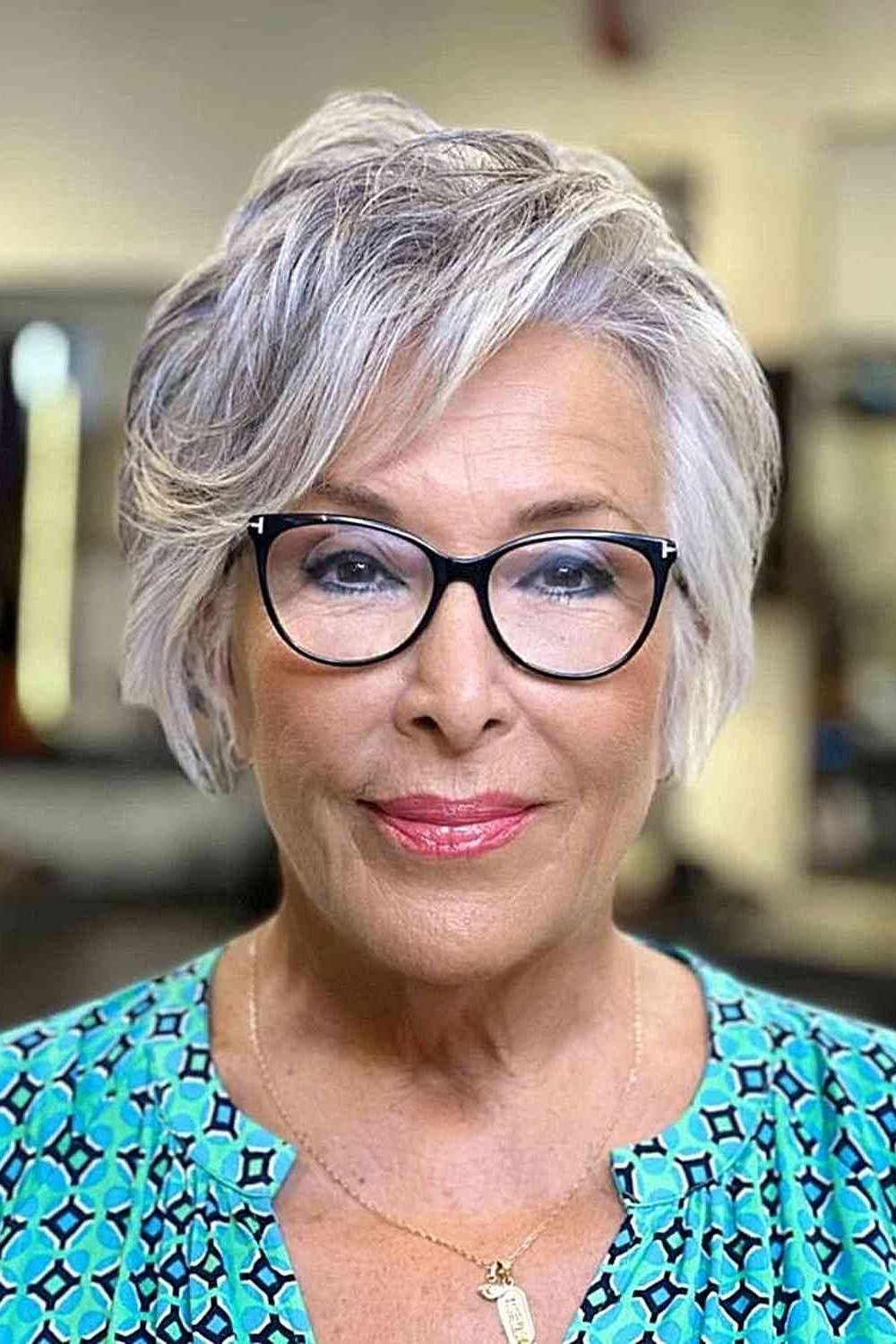 layered white pixie cut with side volume for women over 60