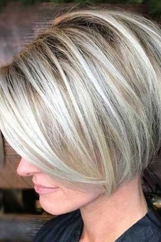 Silver rounded bob haircut for women over 40, side view