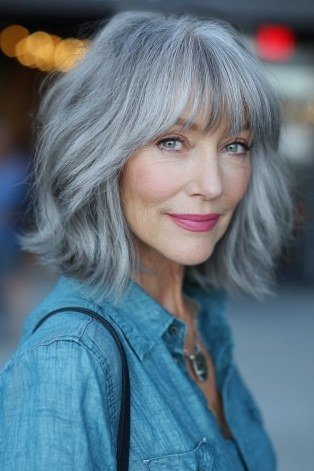 Sleek silver short shaggy bob haircut for senior women