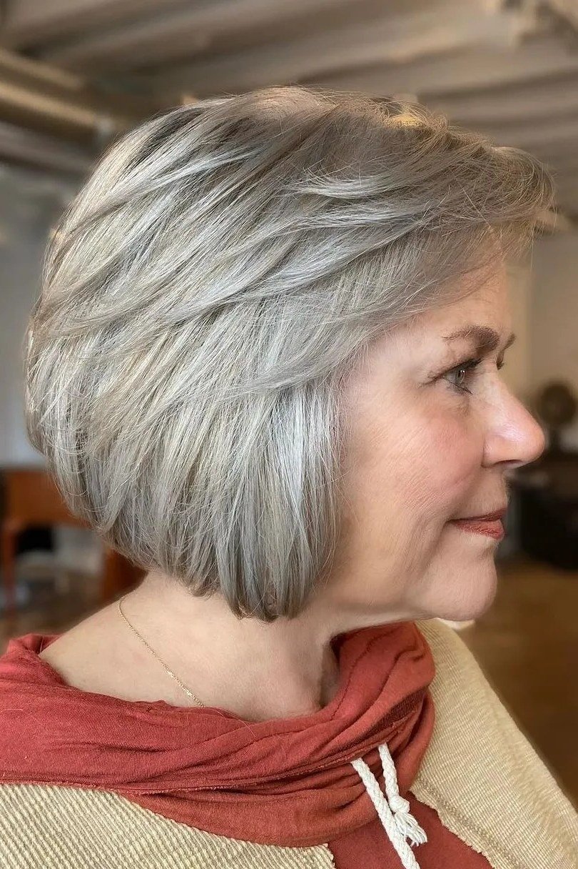 rounded stacked silver bob haircut for women over 60