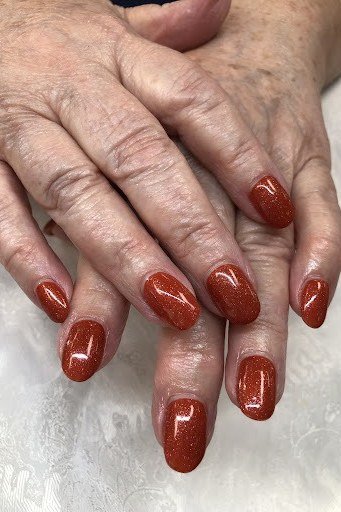 Burnt Orange Glossy Nails for women over 50