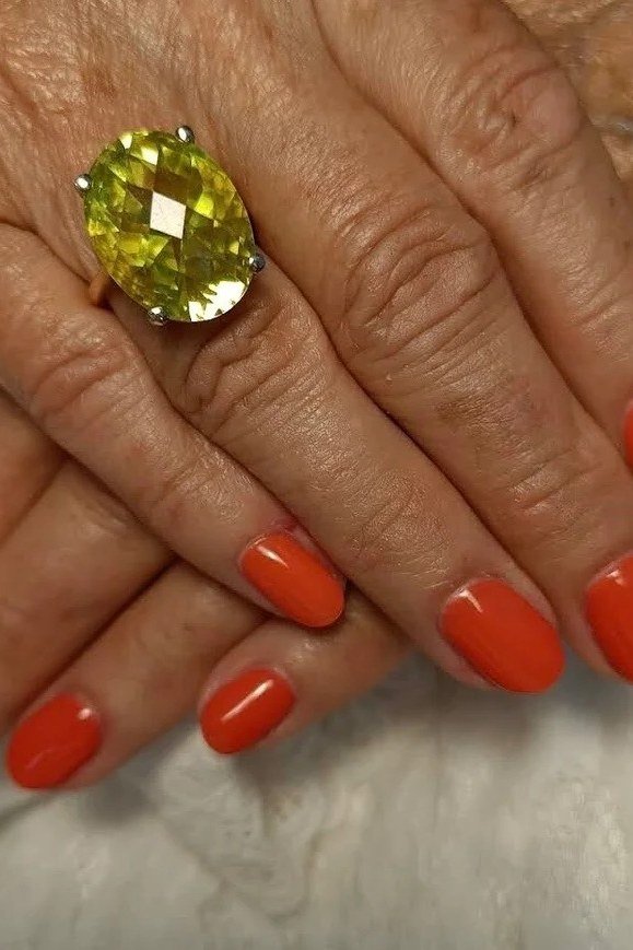 Bright Red Orange Nails for women over 50