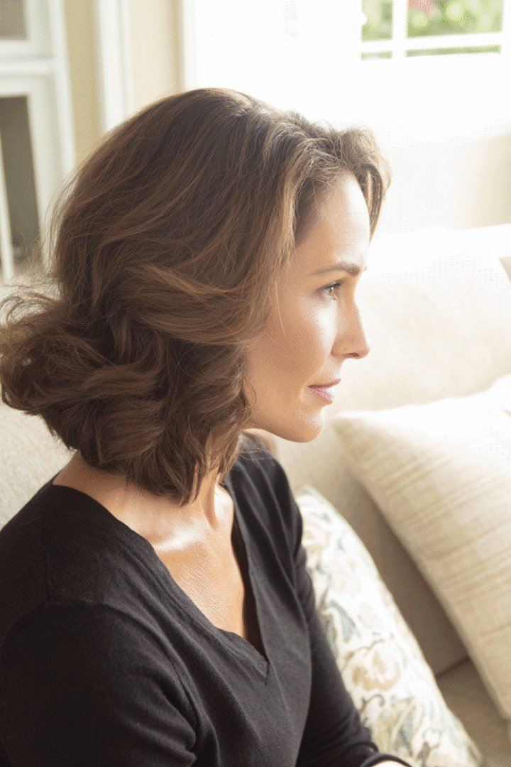 Low bun updo hairstyle for women over 40