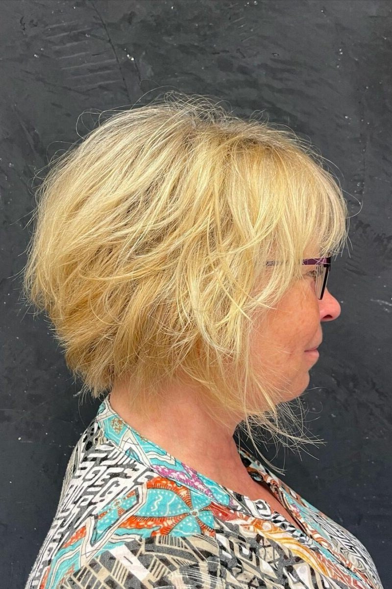 Layered blonde short shaggy bob hairstyle for women over 60