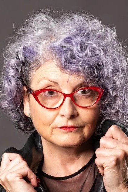 lavender tinted grey curly bob for women over 60