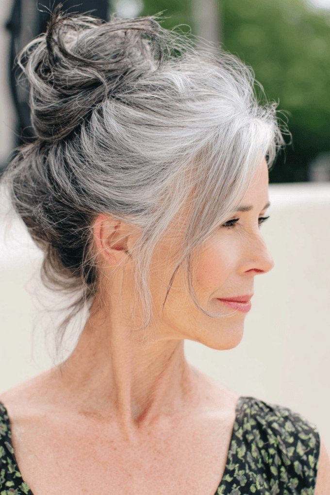 loose silver messy bun for women over 60