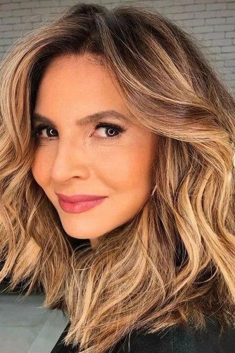 Blonde balayage waves - hairstyle for women over 40